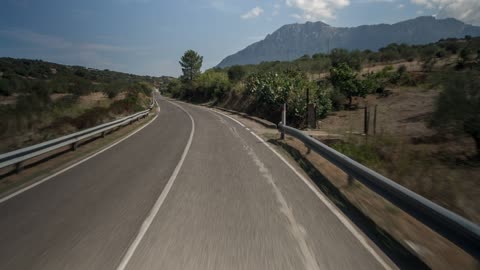 Point of view from a bus passenger seat roading in a highway