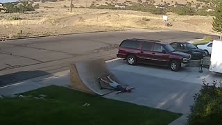 Driveway scooter kid goes up wood ramp falls on head