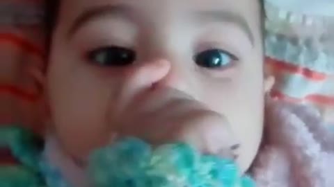 Adorable baby girl says "mama" & "dada" for the first timeBaby Scares Himself By Touching Toy