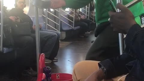 Subway magician does magic trick, bird comes out of empty cooking pan