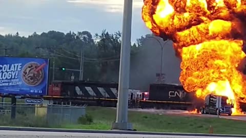 Fireball Engulfs Tanker After Train Collision