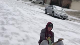 Snow Shovel Makes for a Decent Sled