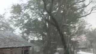 Big Ice storm smashing a car