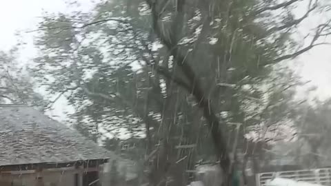 Big Ice storm smashing a car