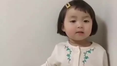 Cute baby girl sing a song