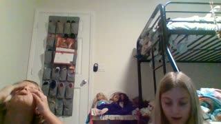 Kyla and Teagan Show Opening Pokemon cards