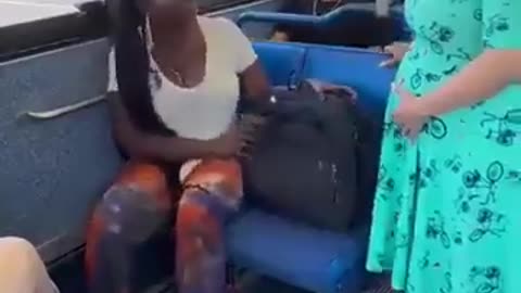 A woman refuses to give her seat to a pregnant woman on the bus.