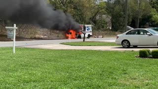 Firefighters Put out Mail Truck Engulfed in Flames