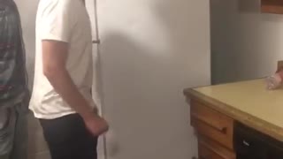 Man fights a fridge