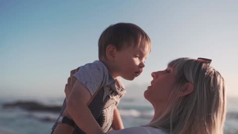 Funny babies kissing Mommy Romantic