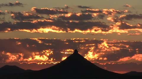 Rate this 1-10: MAGICAL MOMENT DURING SUNRISE OVER MOUNTAINS