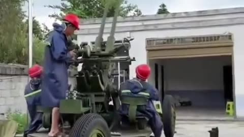 Meanwhile In China - Cloud Seeding with Anti-aircraft Guns