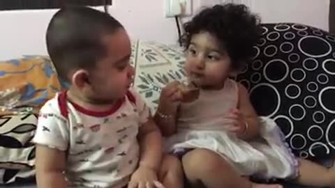 Cute babies brother sister fighting for love