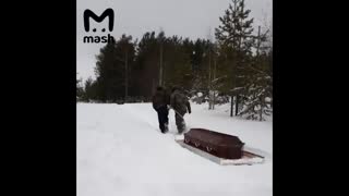 Mourners Forced To Drag Coffin On Sled Through Snow