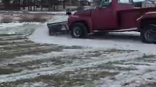 Plowing snow with a old ford truck