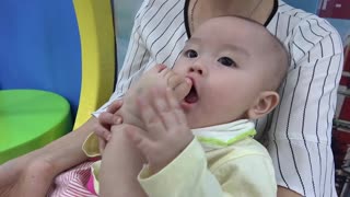 Funny baby and family to playgroup