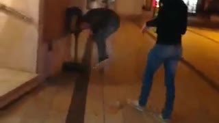 Guy green shirt runs into lamp and breaks it