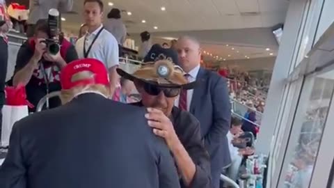 Richard Petty greeting President Trump.