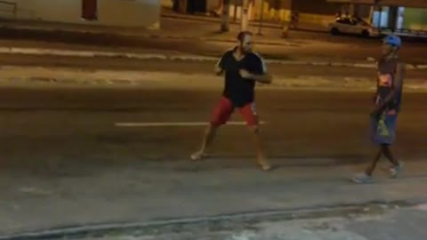 man fighting in the street!!!!!