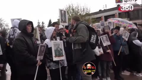 IN RUSSIA, SCHOOLCHILDREN WERE ROUNDED UP TO THE "IMMORTAL REGIMENT" AND HANDED THEM PHOTOGRAPHS OF PEOPLE THEY DO NOT KNOW