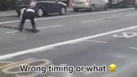 Police officer fails to lay that Spike Strip!