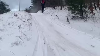 Slow Motion Snowmobile Wipeout