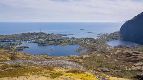 establishing shot of the village of sorvagen on the lofoten islands norway