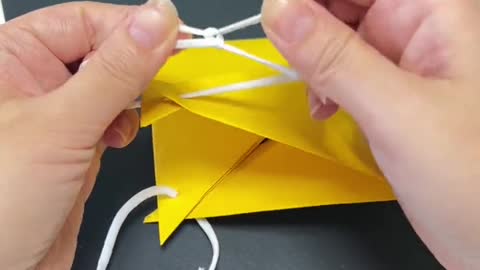 Hand made origami bird's beak is delicate, small and beautiful.