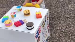 Baby boy shows off epic & adorable ice cream man costume
