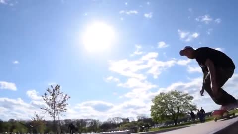 Dude tries to ride on a recycling trash can but eats it