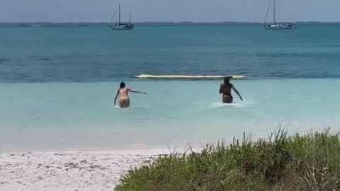 Kendall Jenner and Renell racing to the water❤️‍🔥 📍Puetro Rico #summer #swiming #bikini