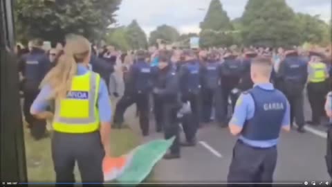 This is how the Gardai (the Irish police) treat their national flag!!! 19-07-24