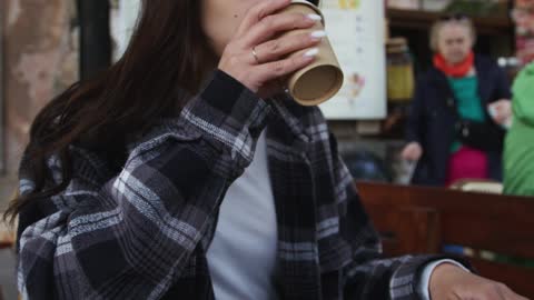 Drinking Coffee at a Café