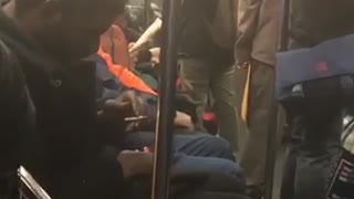 Man subway asleep blunt cigarette in hand