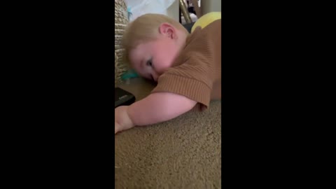 Tired baby isn't quite ready to crawl yet