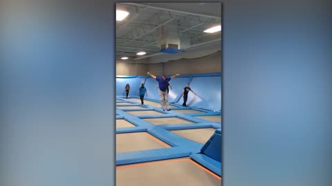 A Man Runs And Jumps On Trampolines