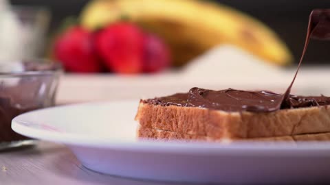 Chocolate or hazelnut cream on white bread