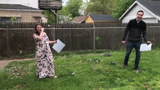 Expecting Parents Pop Giant Balloons To Reveal Their Twin's Genders