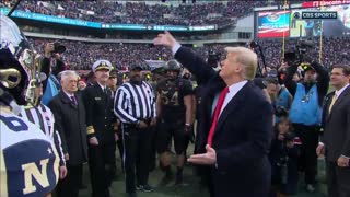 President Donald Trump performs Army Navy game coin toss