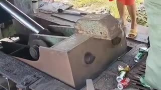 Watch the Empty Plastic Bottles of Cold Drink Being Crushed