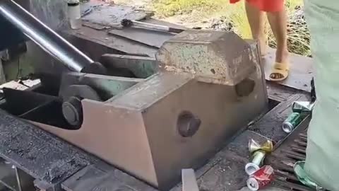 Watch the Empty Plastic Bottles of Cold Drink Being Crushed