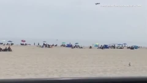 Small plane plummets into ocean on a New Hampshire beach