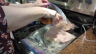 Marinating Chicken in Italian Dressing for Future Meals!