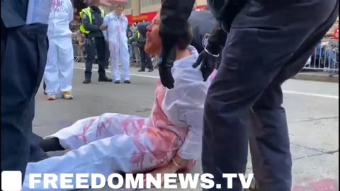 Pro-Palestinian mob glued themselves to the pavement.