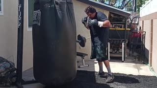 500 Pound Punching bag Workout part 79. tackling Bag!