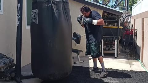 500 Pound Punching bag Workout part 79. tackling Bag!