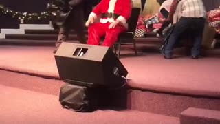 Santa Takes a Tumble on the Stage