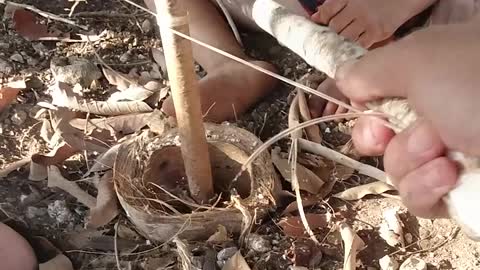 How To Start a Fire With Two Sticks and Fishing Line