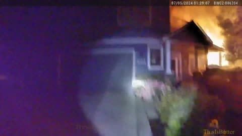 Redmond PD release bodycam video of officers kicking in door, rescuing 5 people from burning home