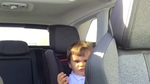 Kid Rocks Out on Car Ride
